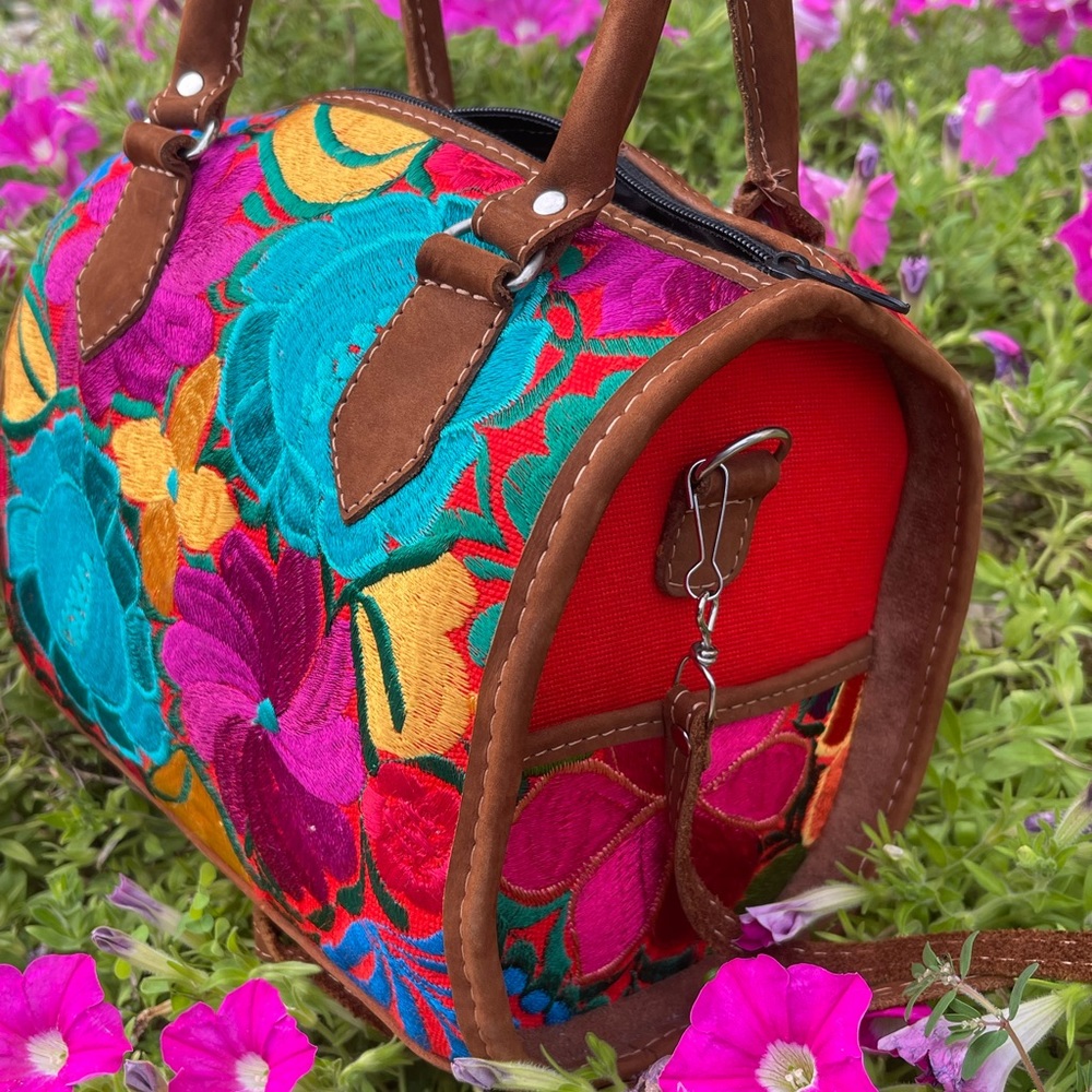 Median size,colorful bag, bag or purse.